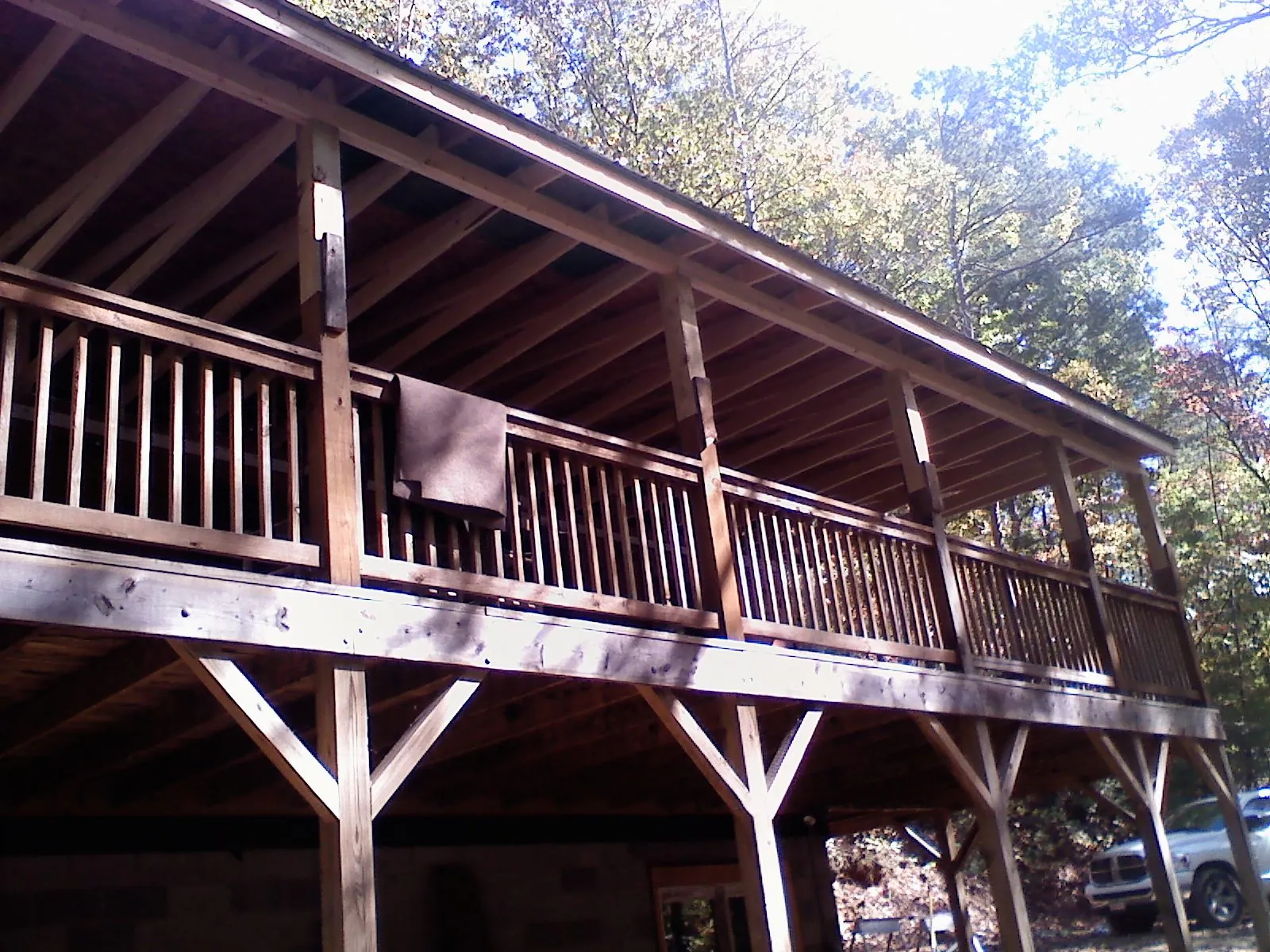Timber framing under a new elevated porch and deck — Roof Leak Repair in Whitsett by Roofing Brothers